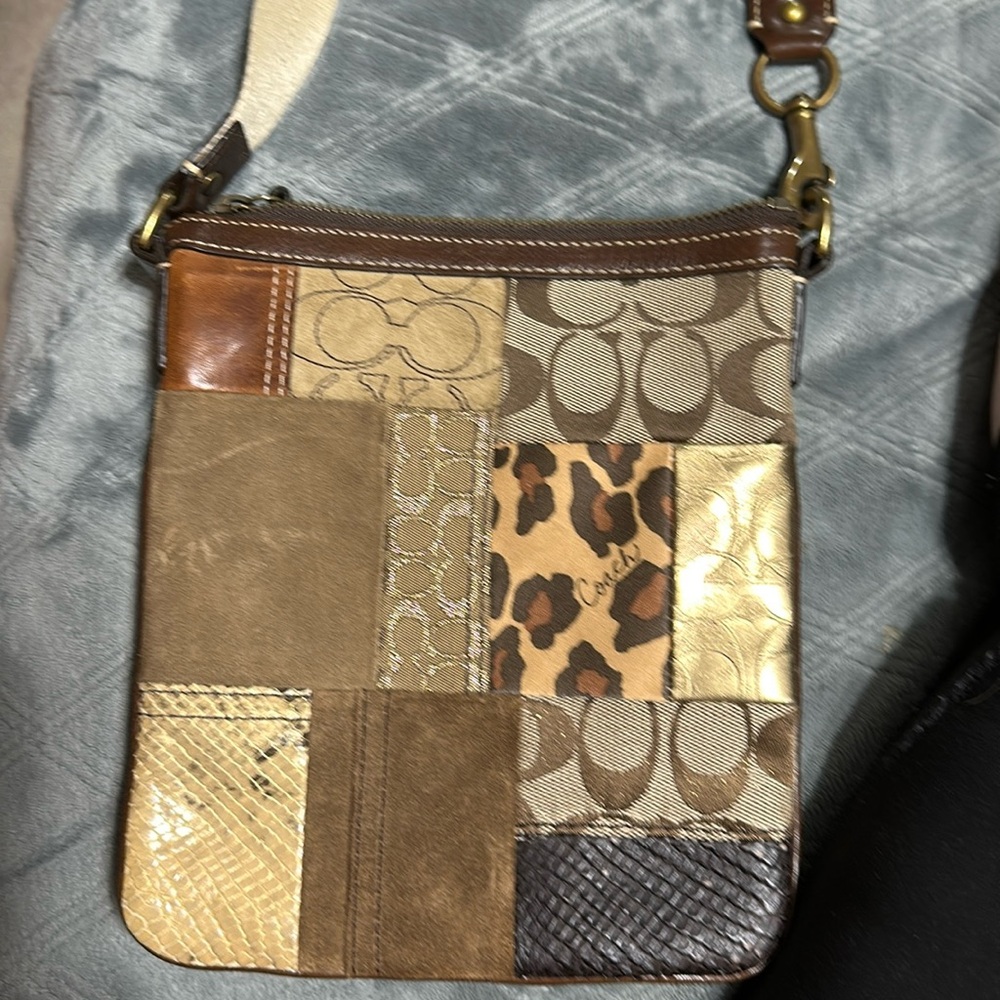 Small coach multi color bag.
